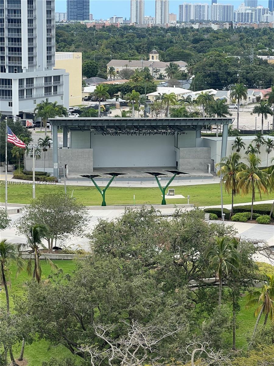 a view of a city with a lake