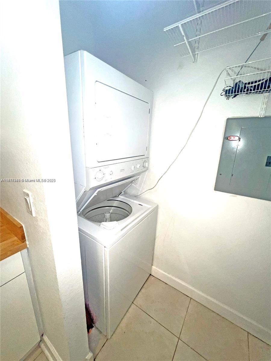 Royal Poinciana Hollywood, FL 33020 - Photo 26 of 26 a utility room with dryer and washer