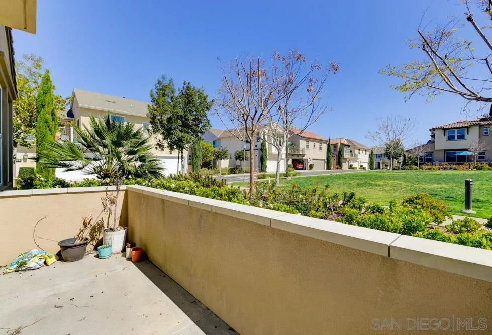 4314 Star Path Way, Unit 1 Oceanside, CA 92056 - Photo 13 of 40 a view of a couches in the patio and a yard