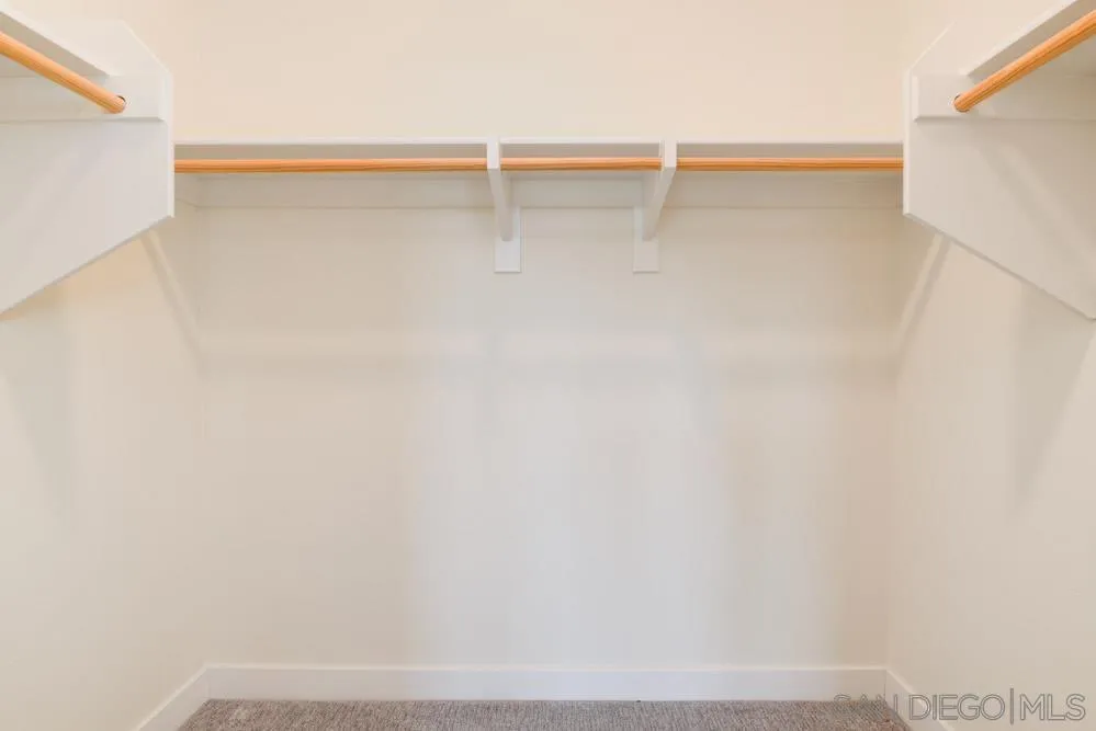 4314 Star Path Way, Unit 1 Oceanside, CA 92056 - Photo 19 of 40 a view of small space with racks on the wall