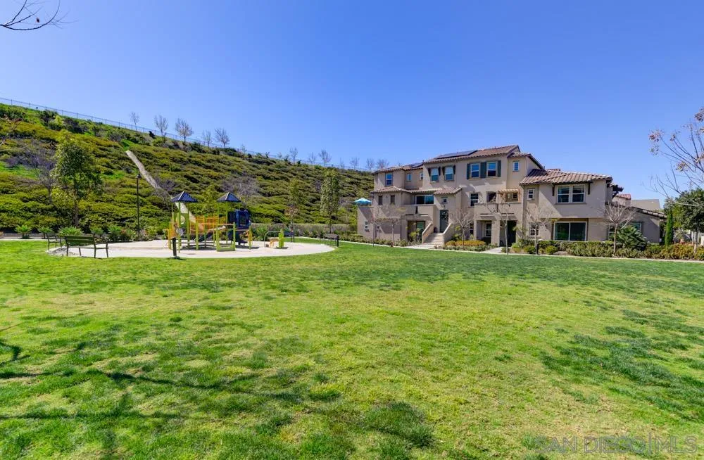 4314 Star Path Way, Unit 1 Oceanside, CA 92056 - Photo 28 of 40 a view of building with outdoor space