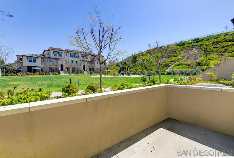4314 Star Path Way, Unit 1 Oceanside, CA 92056 - Photo 30 of 40 a view of a house with a yard