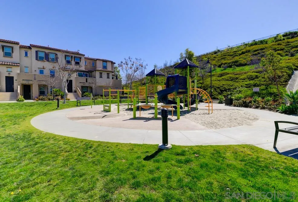 4314 Star Path Way, Unit 1 Oceanside, CA 92056 - Photo 34 of 40 a sign board with buildings in the background