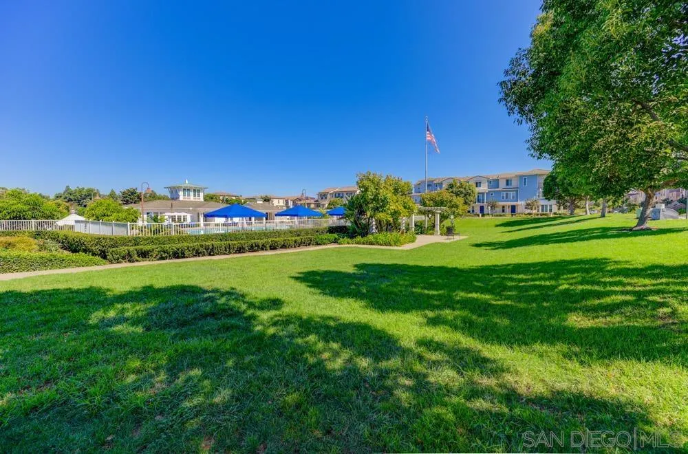 4314 Star Path Way, Unit 1 Oceanside, CA 92056 - Photo 38 of 40 a view of a grassy field with trees