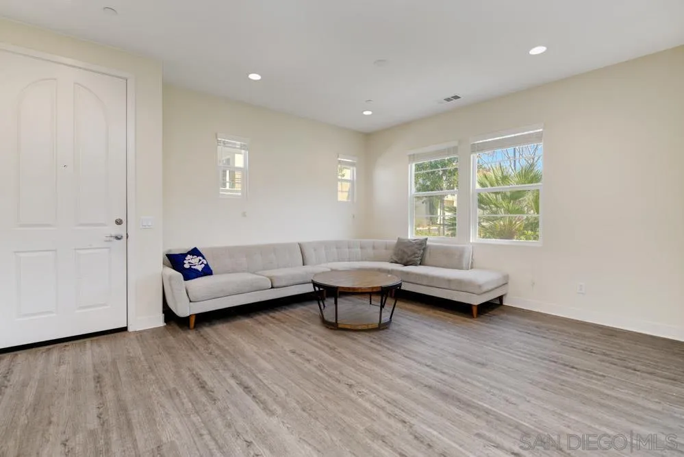 4314 Star Path Way, Unit 1 Oceanside, CA 92056 - Photo 10 of 40 a living room with furniture and a window