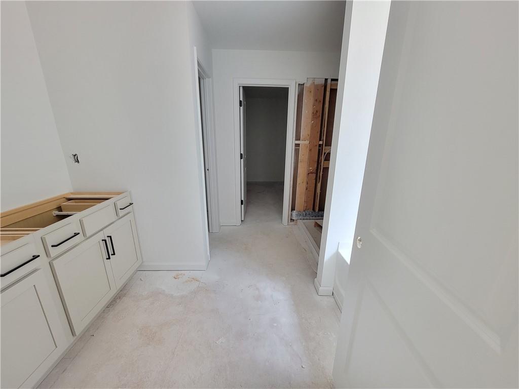 348 Silverleaf Trail Bethlehem, GA 30620 - Photo 12 of 30 a view of a kitchen with white cabinets