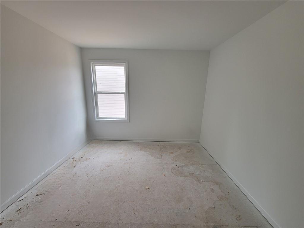 348 Silverleaf Trail Bethlehem, GA 30620 - Photo 13 of 30 an empty room with a window