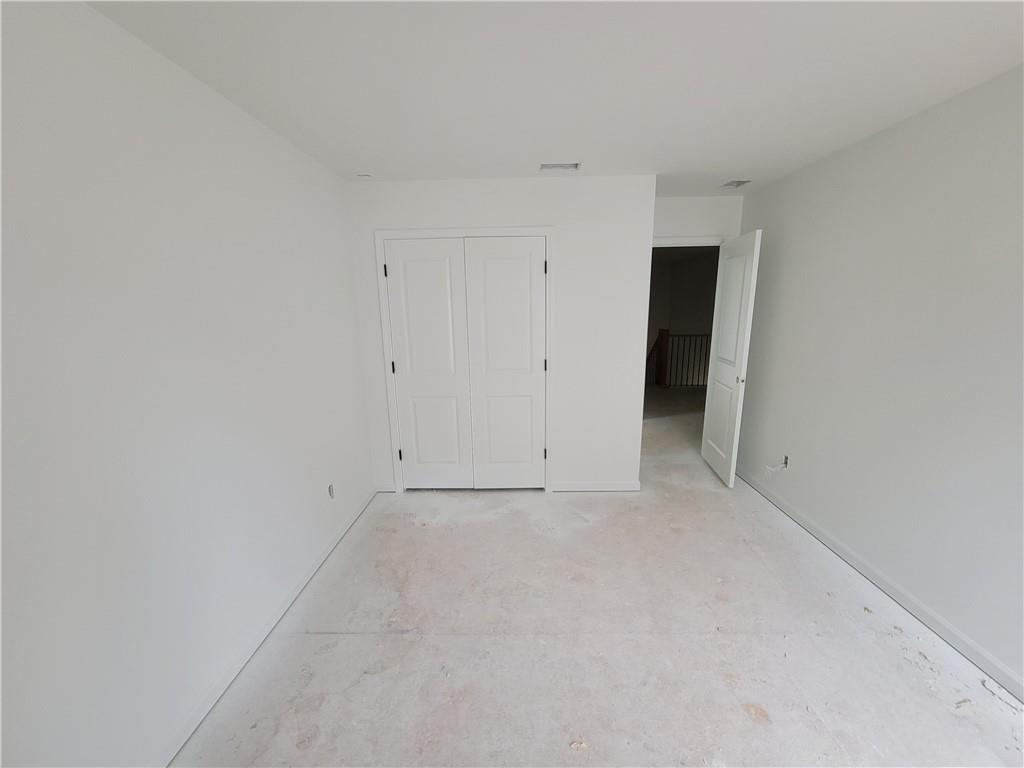 348 Silverleaf Trail Bethlehem, GA 30620 - Photo 14 of 30 a view of an empty room