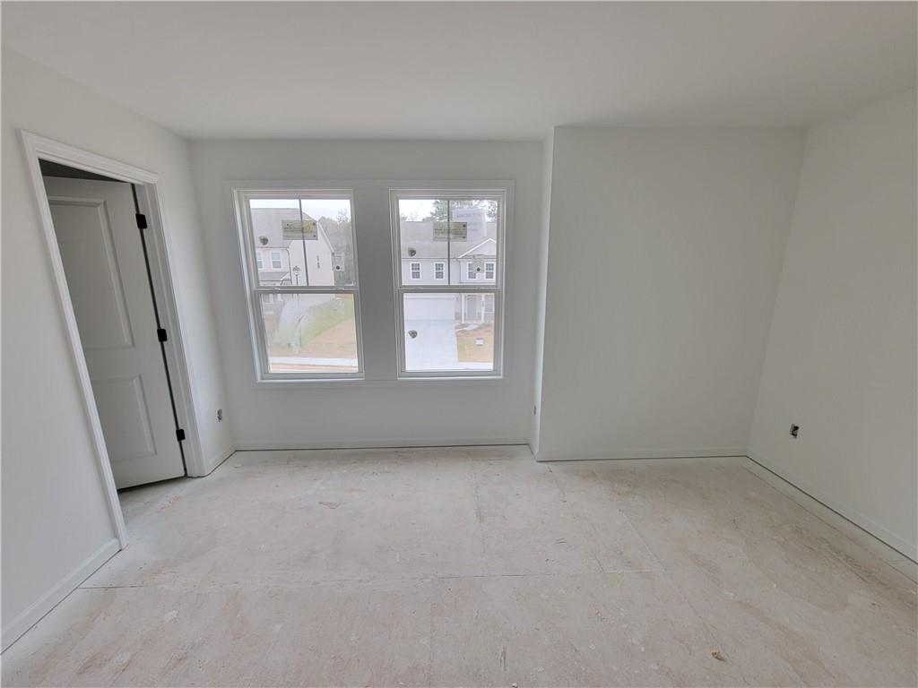 348 Silverleaf Trail Bethlehem, GA 30620 - Photo 15 of 30 a view of an empty room with a window
