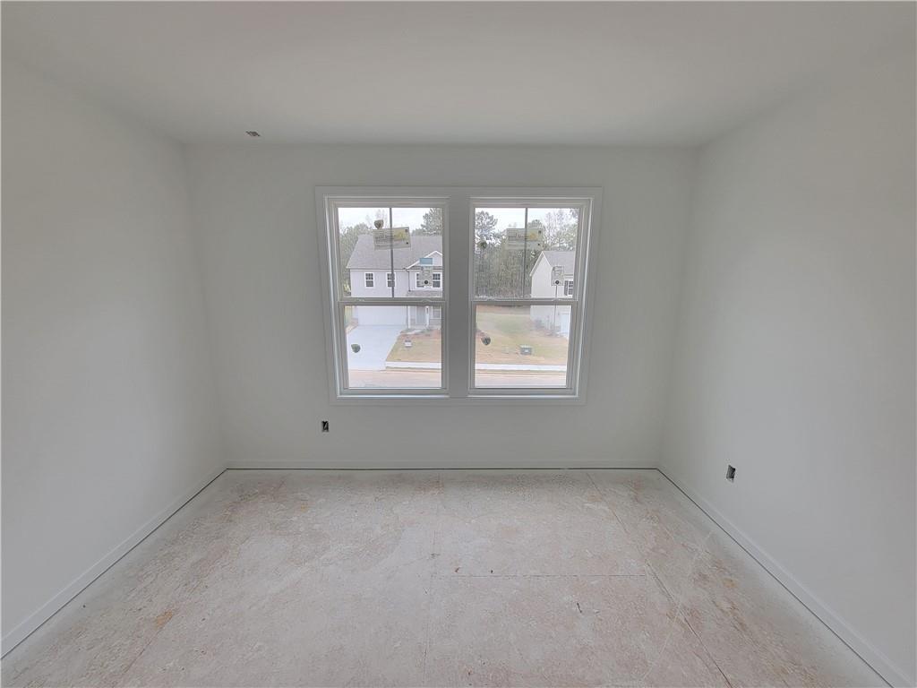 348 Silverleaf Trail Bethlehem, GA 30620 - Photo 16 of 30 an empty room with a window