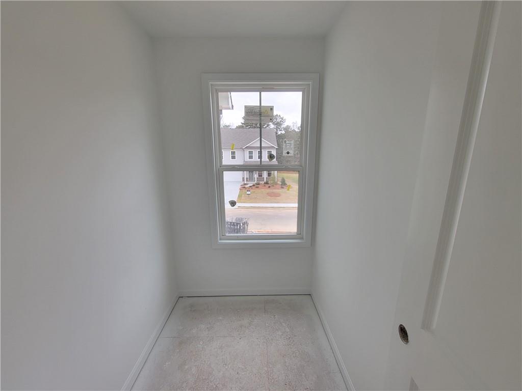 348 Silverleaf Trail Bethlehem, GA 30620 - Photo 17 of 30 an empty room with a window