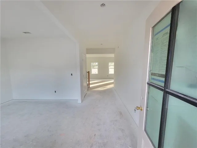 an empty room with windows