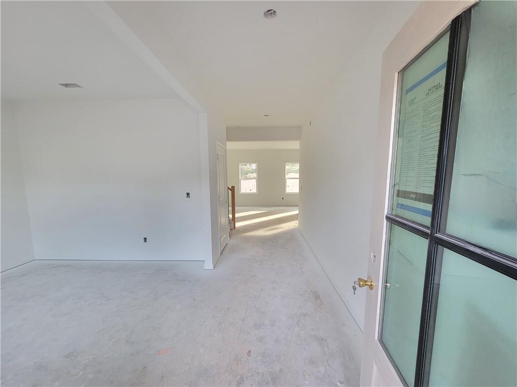 348 Silverleaf Trail Bethlehem, GA 30620 - Photo 4 of 30 an empty room with windows