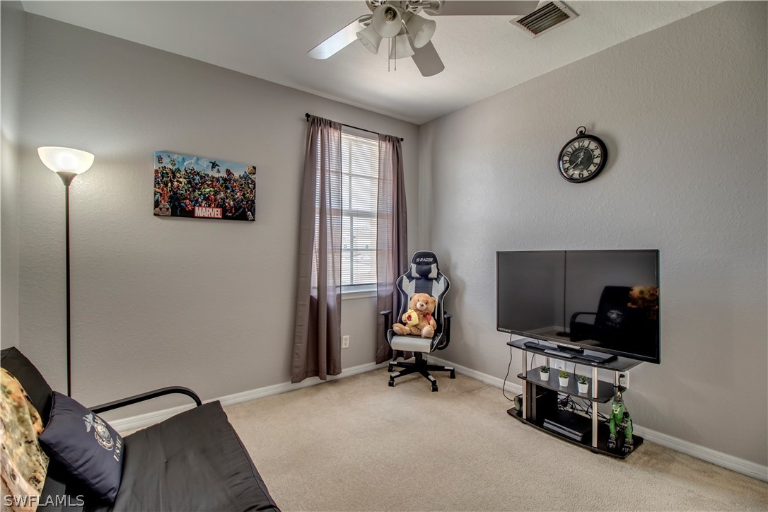 4084 Cherrybrook Loop Fort Myers, FL 33966 - Photo 19 of 29 a view of a workspace with furniture and a window