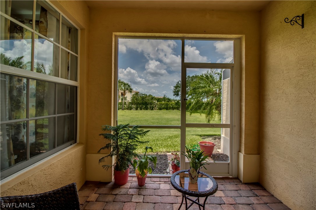 4084 Cherrybrook Loop Fort Myers, FL 33966 - Photo 20 of 29 a vase of flowers sitting on a table