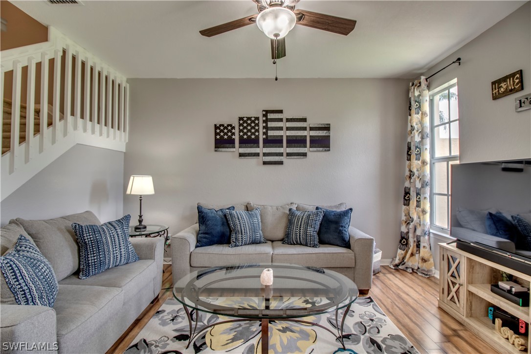 4084 Cherrybrook Loop Fort Myers, FL 33966 - Photo 2 of 29 a living room with furniture