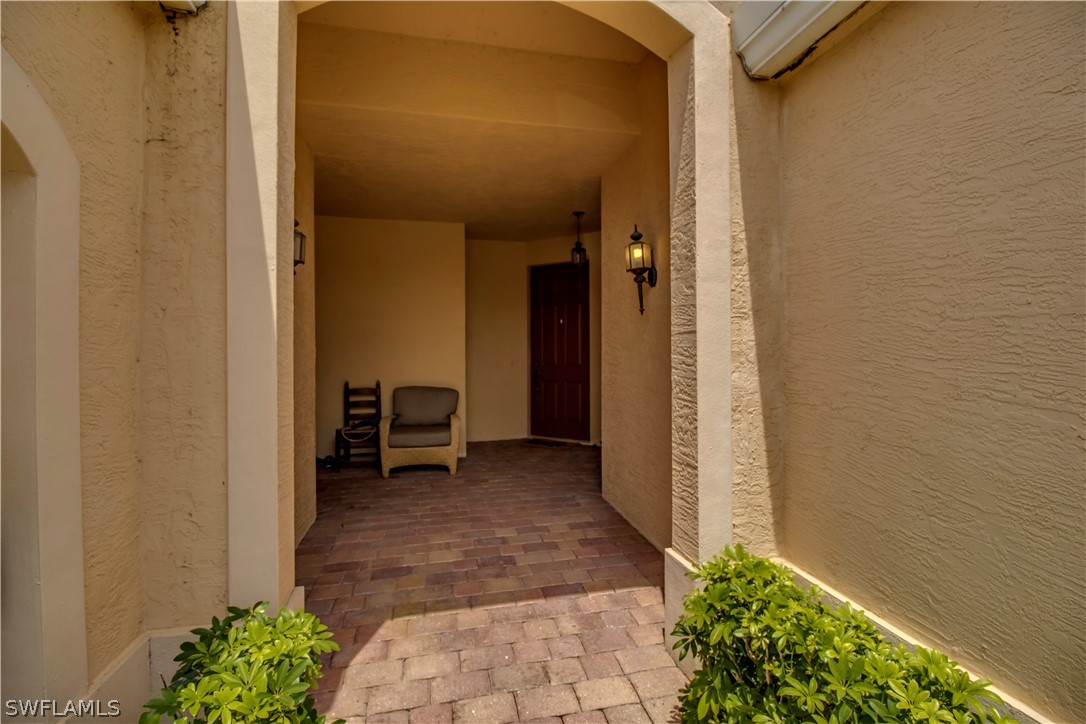 4084 Cherrybrook Loop Fort Myers, FL 33966 - Photo 22 of 29 a view of a hallway with wooden shelves