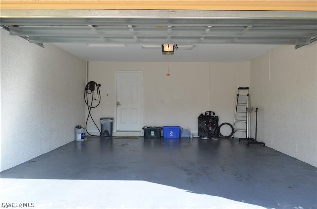 4084 Cherrybrook Loop Fort Myers, FL 33966 - Photo 24 of 29 a view of a living room and utility room