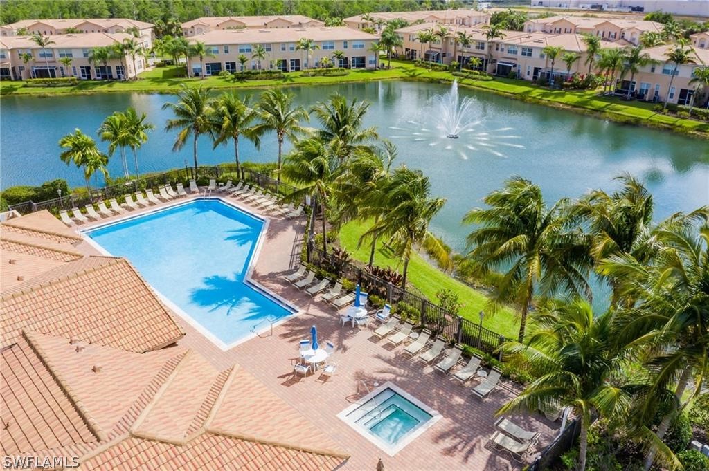 4084 Cherrybrook Loop Fort Myers, FL 33966 - Photo 25 of 29 an aerial view of a house with a lake view