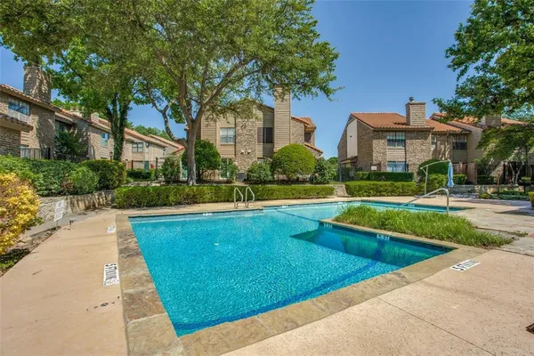 a picture of a wall with a white and white refrigerator