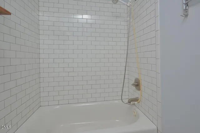 a close up of a bathtub