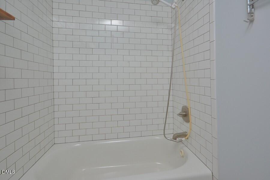 1030 Cornell Street, Unit B Durham, NC 27707 - Photo 15 of 22 a close up of a bathtub