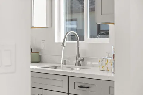 a bedroom with a bed and a table in it