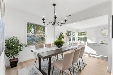 a kitchen with a sink cabinets and stainless steel appliances