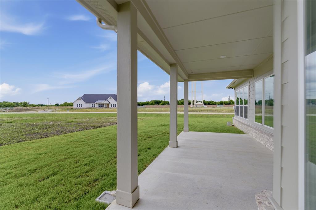 2204 Continent Court Krum, TX 76249 - Photo 23 of 28 Covered patio with a concrete surface and architectural columns