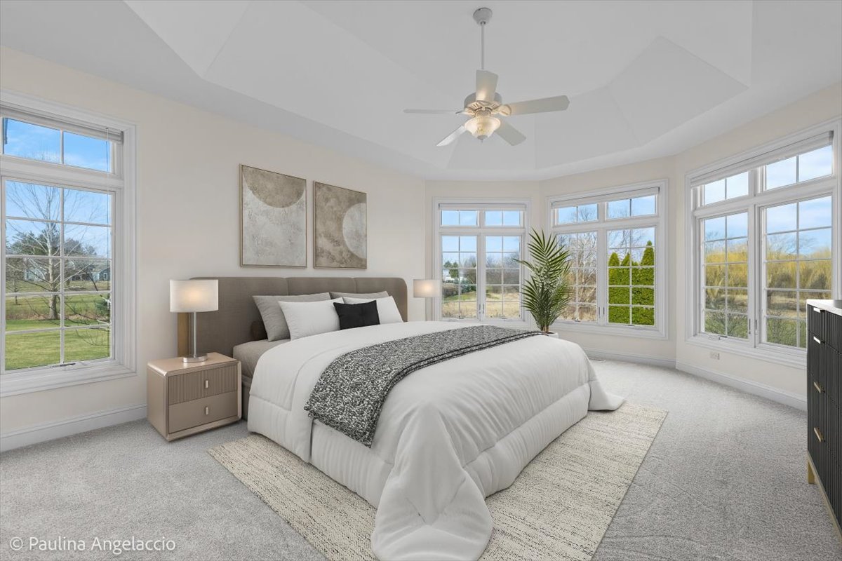 1175 Woodburn Court Inverness, IL 60067 - Photo 25 of 68 a spacious bedroom with a large bed and a large window