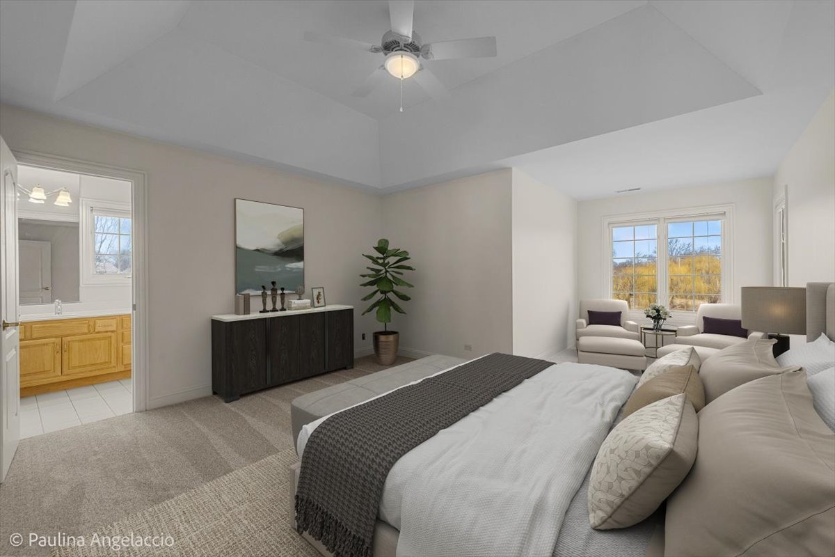 1175 Woodburn Court Inverness, IL 60067 - Photo 30 of 68 a bedroom with a bed a couch and dresser