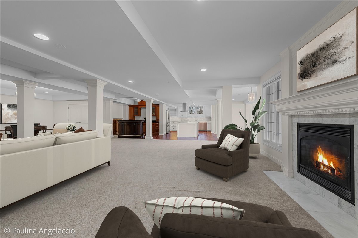 1175 Woodburn Court Inverness, IL 60067 - Photo 39 of 68 a living room with furniture and a fireplace