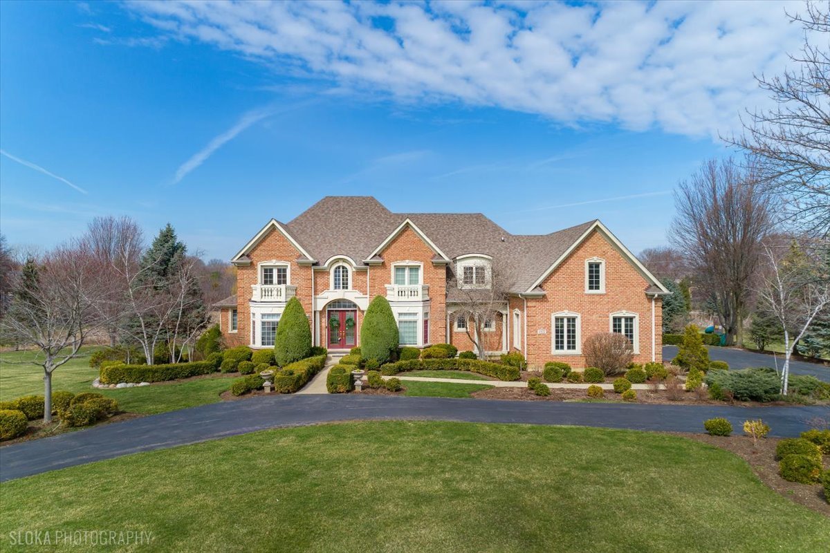1175 Woodburn Court Inverness, IL 60067 - Photo 4 of 68 a view of a house with a big yard