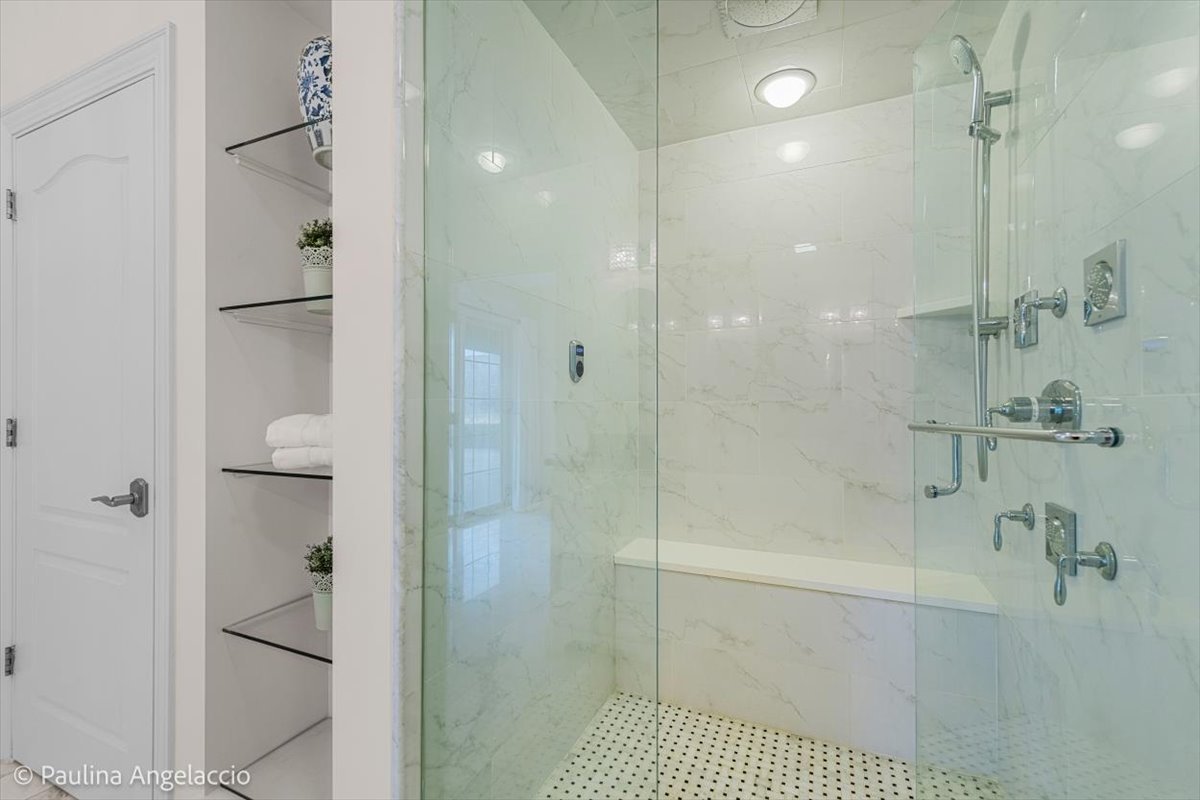 1175 Woodburn Court Inverness, IL 60067 - Photo 48 of 68 a bathroom with a shower