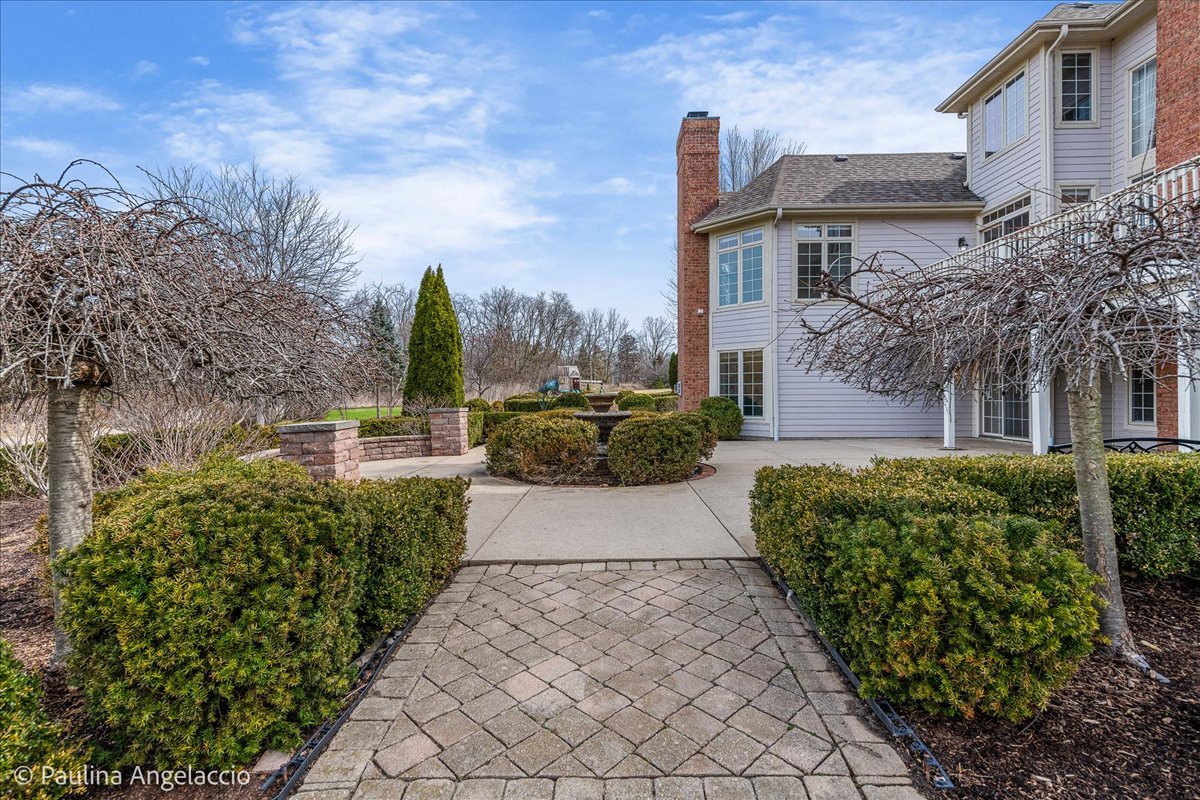 1175 Woodburn Court Inverness, IL 60067 - Photo 53 of 68 a view of a garden with pathway