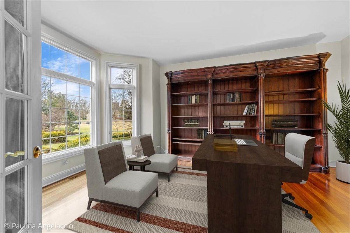 1175 Woodburn Court Inverness, IL 60067 - Photo 8 of 68 a view of a livingroom with workspace and a window