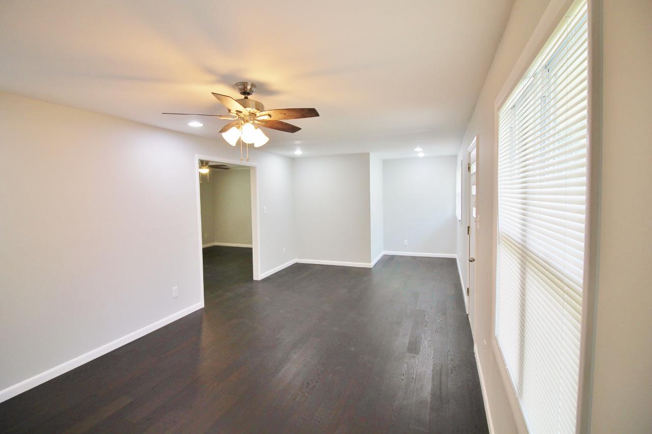 1865 Walnut Grove Road Lebanon, TN 37090 - Photo 6 of 25 wooden floor in an empty room with a window