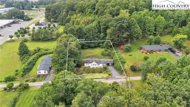 a view of swimming pool a patio and lake view