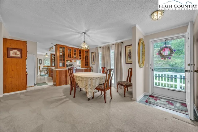 a view of a livingroom with furniture and window