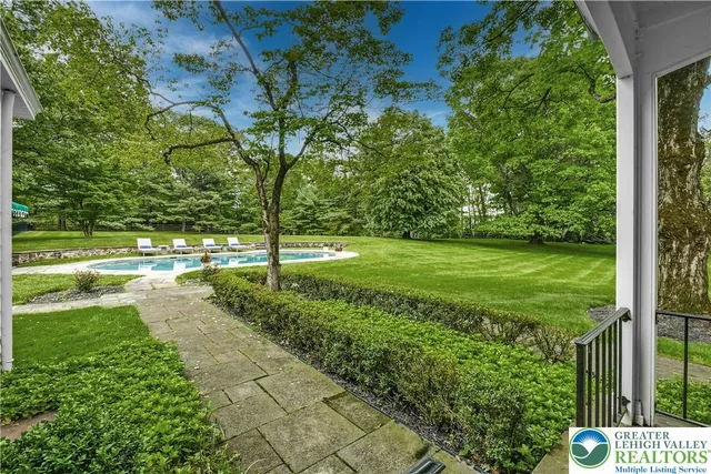 a view of a trees with yard