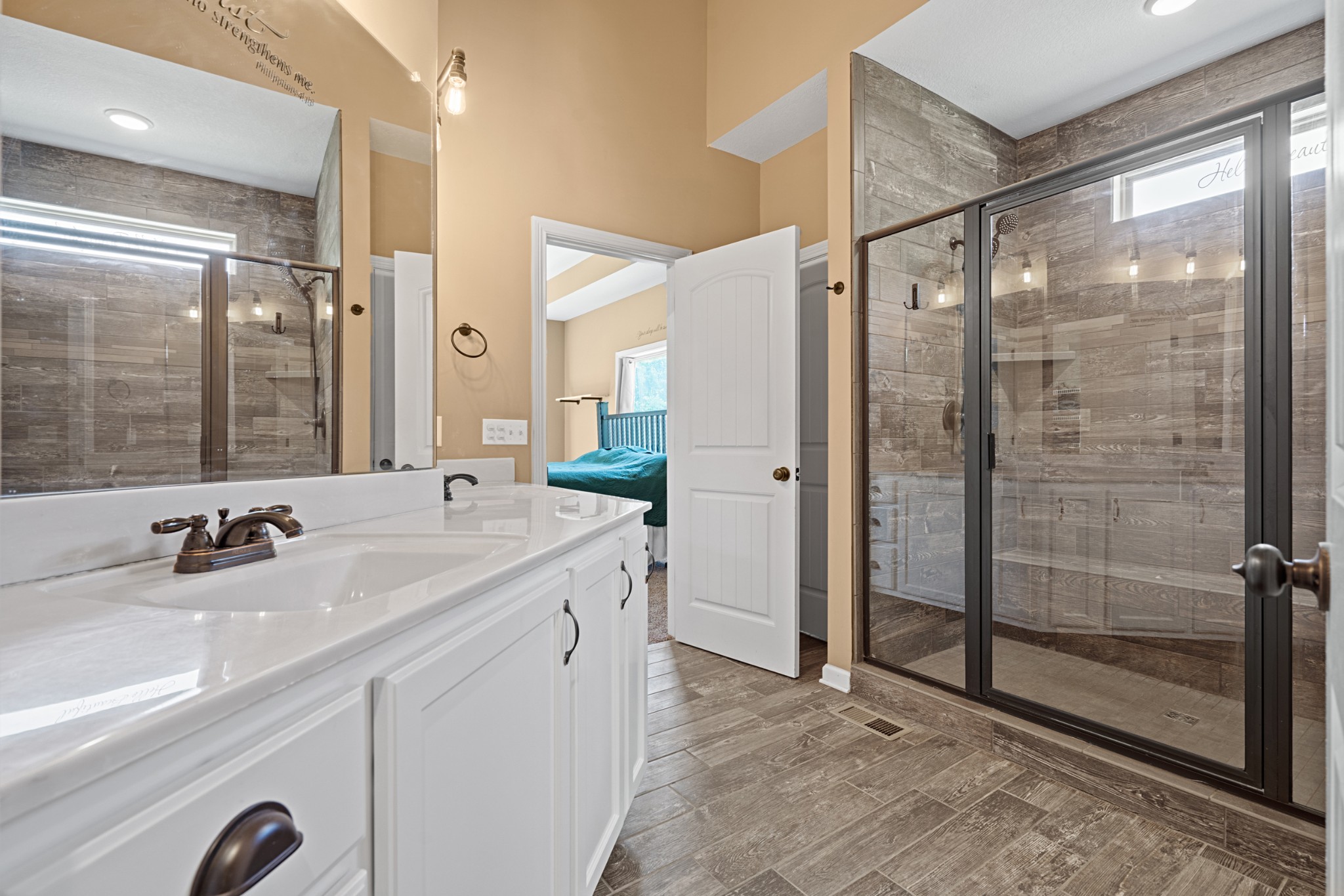 1506 Bend Road Clarksville, TN 37040 - Photo 25 of 56 a bathroom with a shower sink and mirror