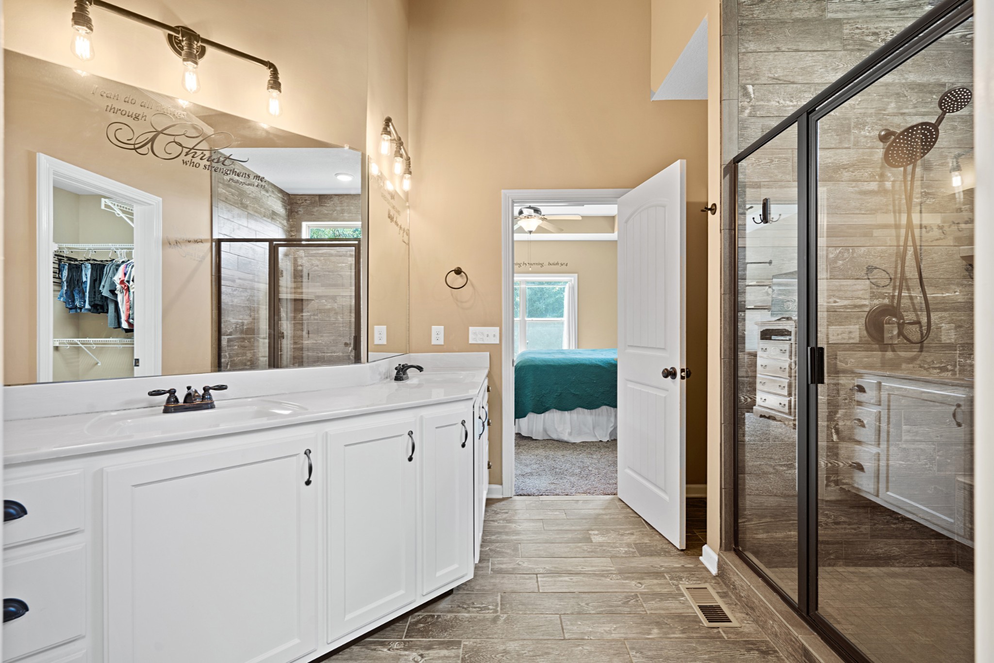 1506 Bend Road Clarksville, TN 37040 - Photo 26 of 56 a spacious bathroom with a double vanity sink mirror and shower