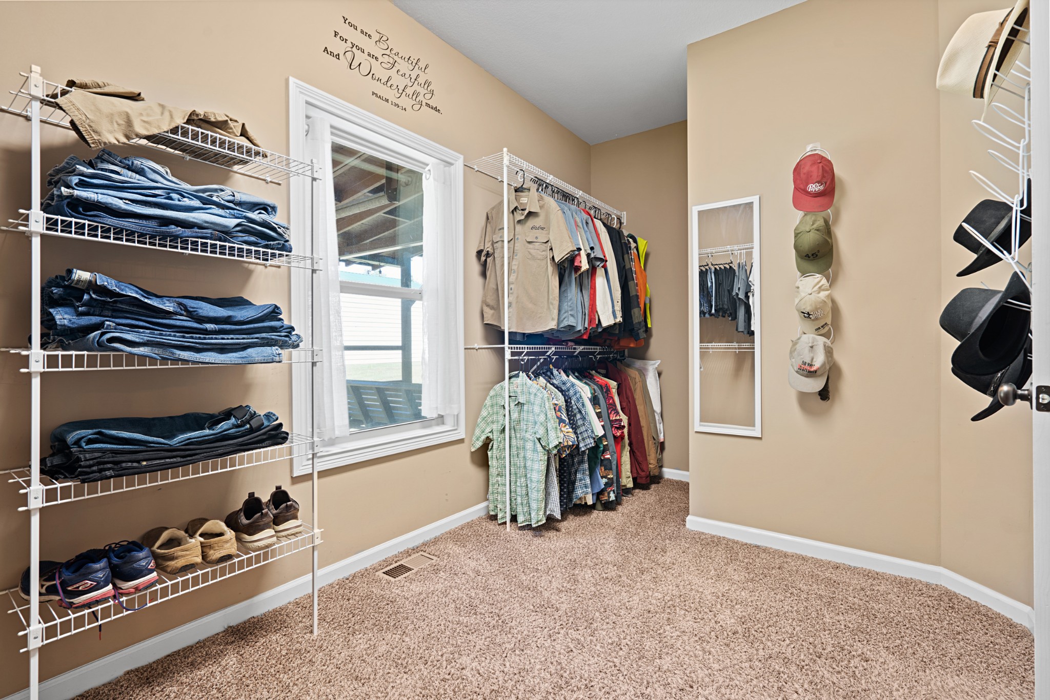 1506 Bend Road Clarksville, TN 37040 - Photo 27 of 56 a view of walk in closet with clothes and shoes