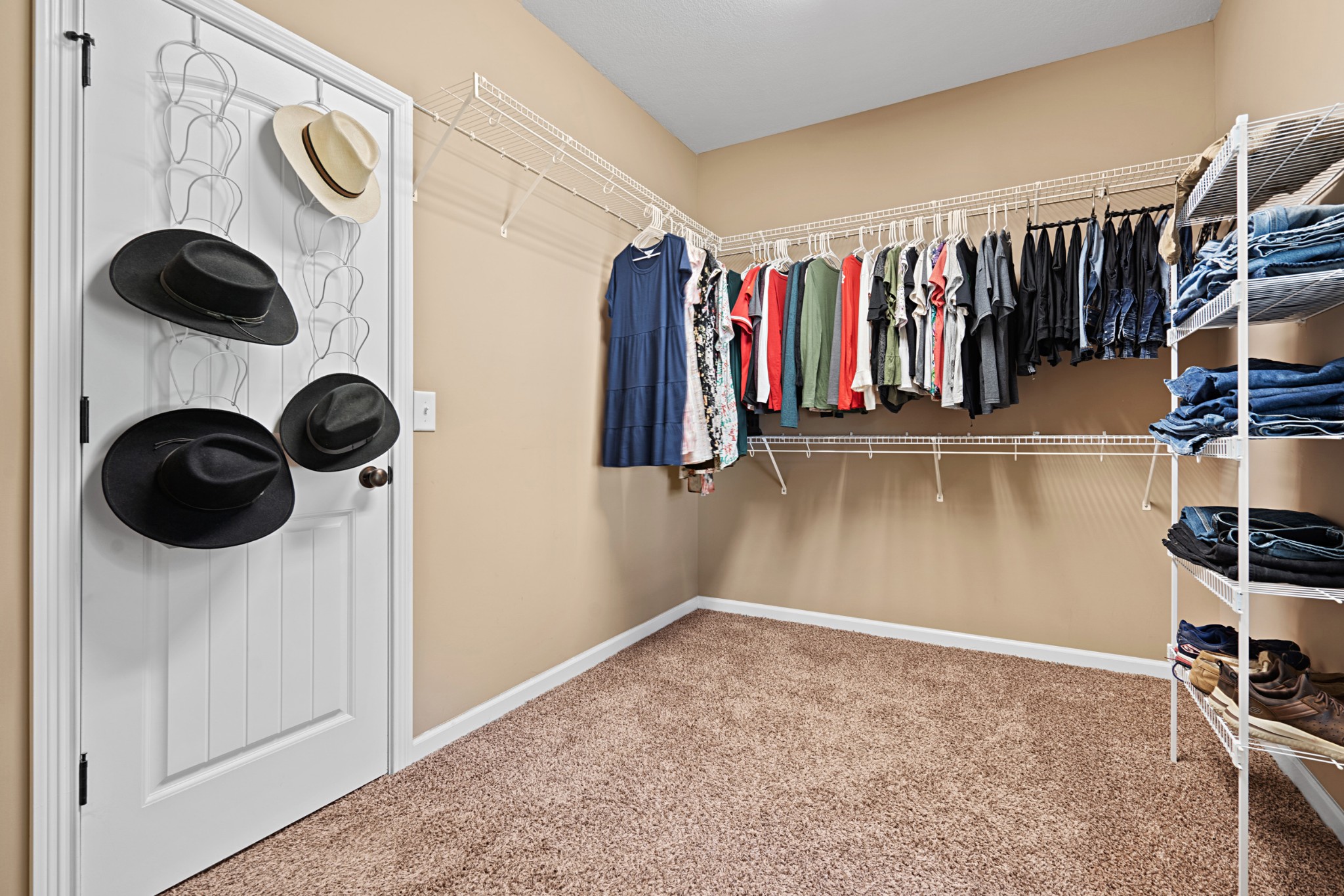 1506 Bend Road Clarksville, TN 37040 - Photo 28 of 56 a view of walk in closet with clothes and shoes
