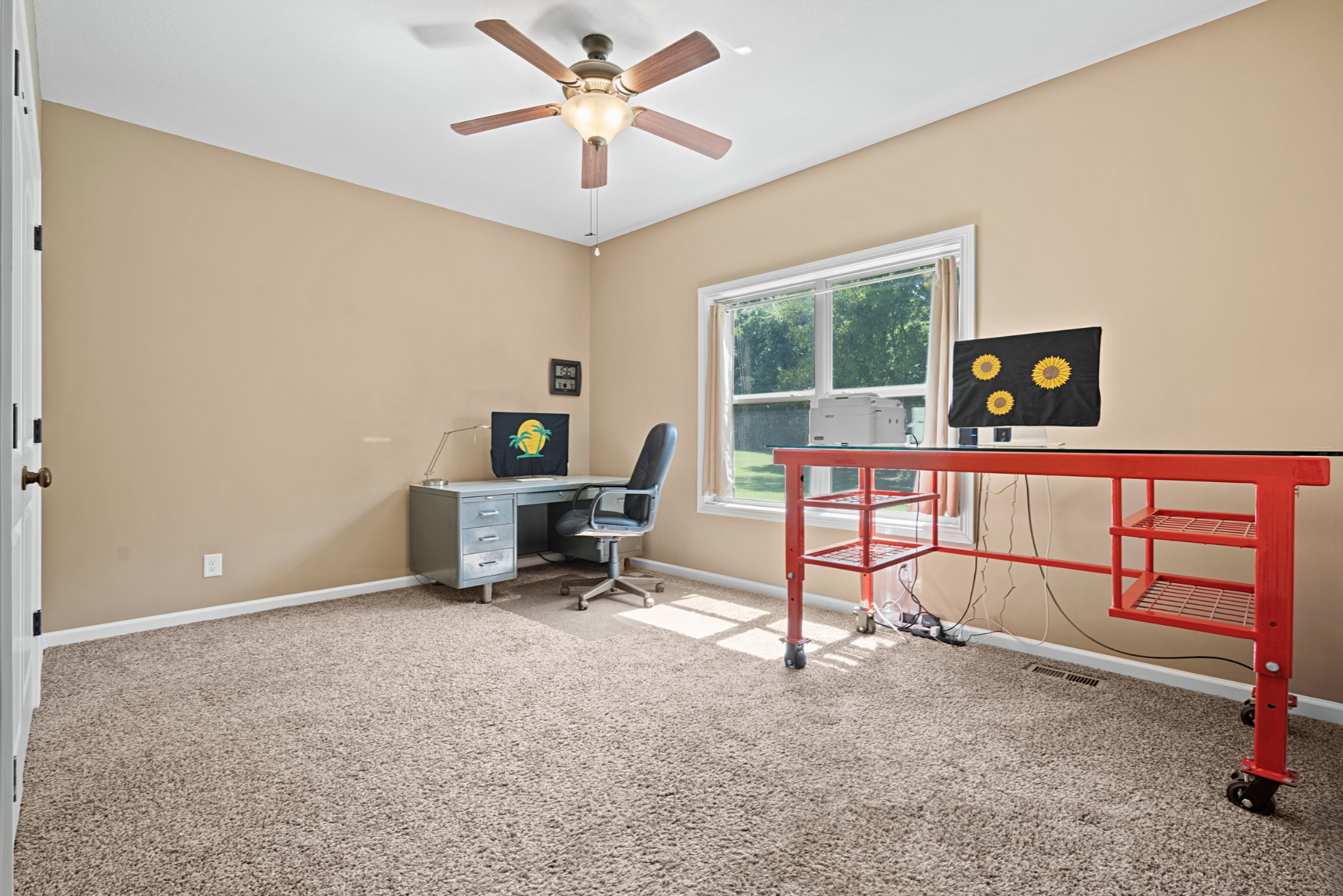 1506 Bend Road Clarksville, TN 37040 - Photo 36 of 56 a view of a workspace with furniture and a window