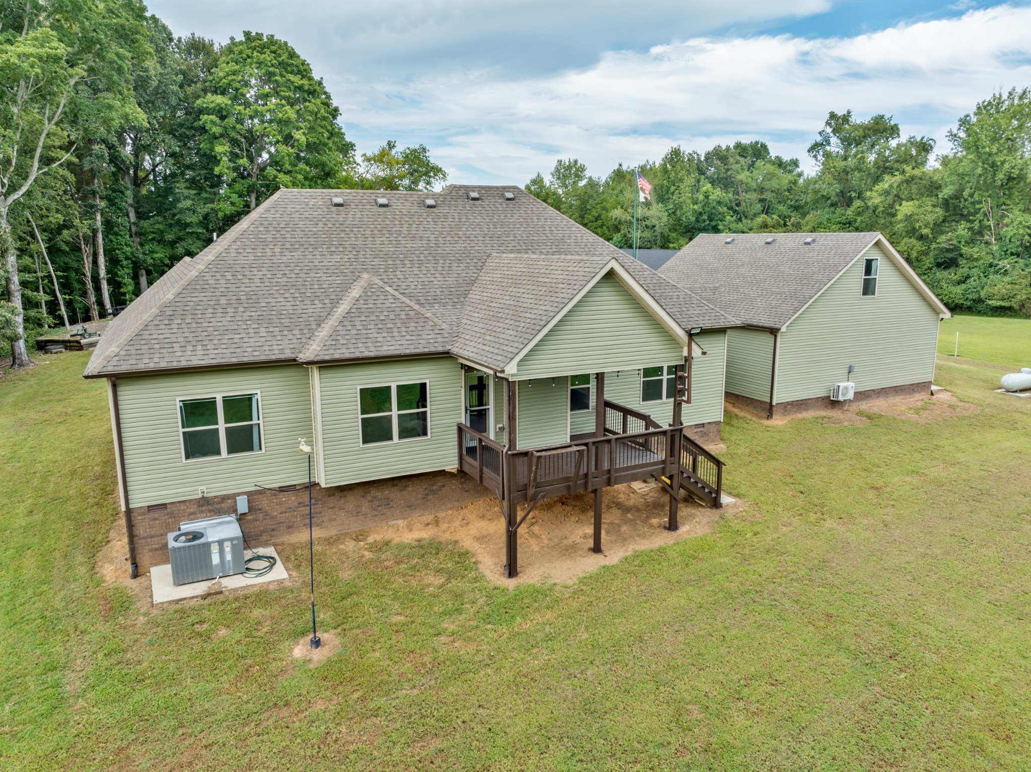 1506 Bend Road Clarksville, TN 37040 - Photo 50 of 56 a view of a house with table and chairs in patio