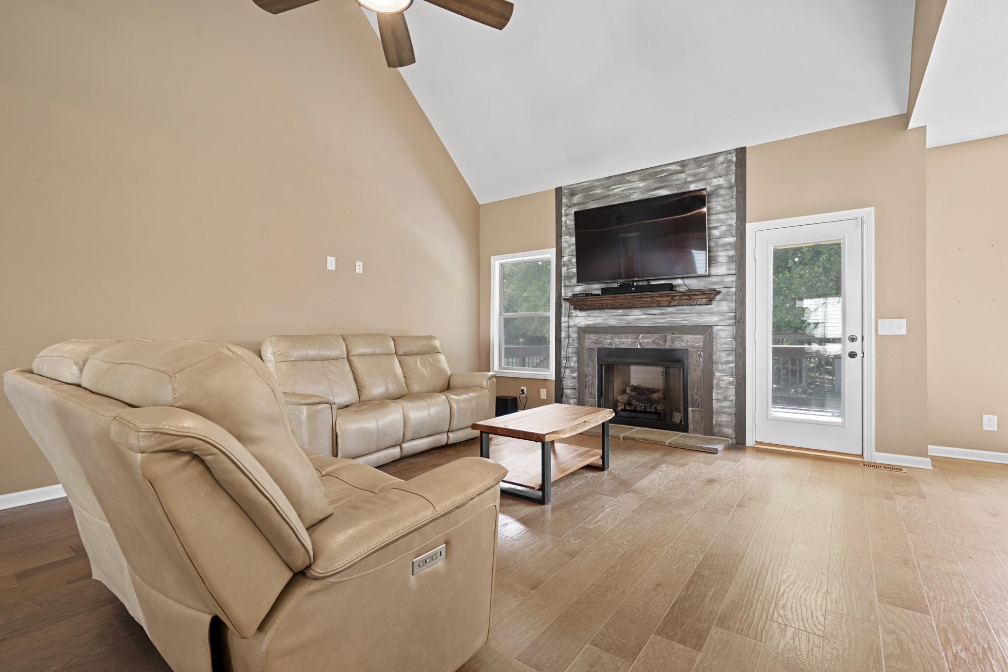 1506 Bend Road Clarksville, TN 37040 - Photo 8 of 56 a living room with furniture a flat screen tv and a fireplace