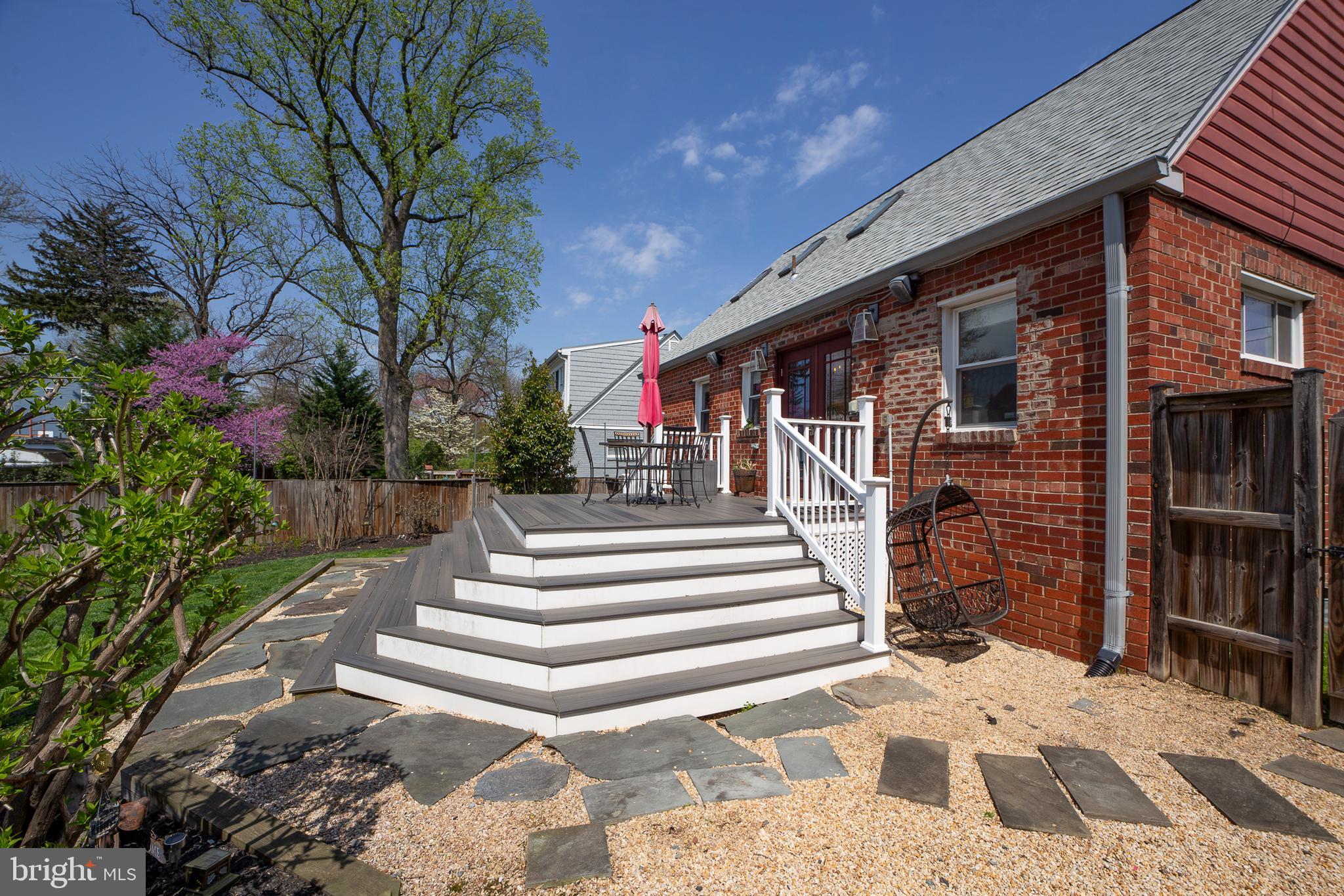 311 Timberwood Avenue Silver Spring, MD 20901 - Photo 14 of 44 a view of a house with a yard
