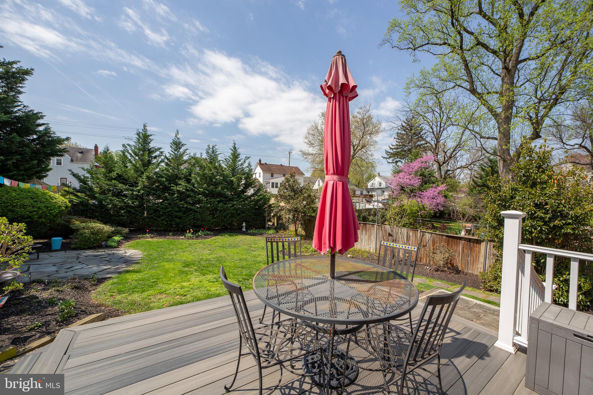 311 Timberwood Avenue Silver Spring, MD 20901 - Photo 15 of 44 a table and chairs with the view of tree in front of it
