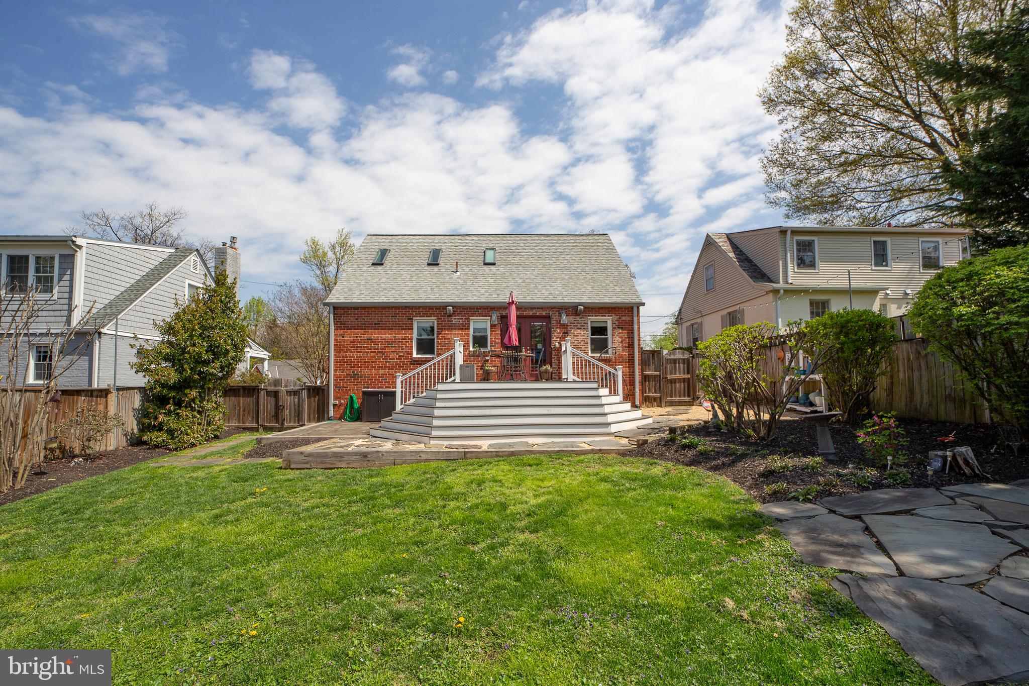 311 Timberwood Avenue Silver Spring, MD 20901 - Photo 16 of 44 a view of a house with a yard